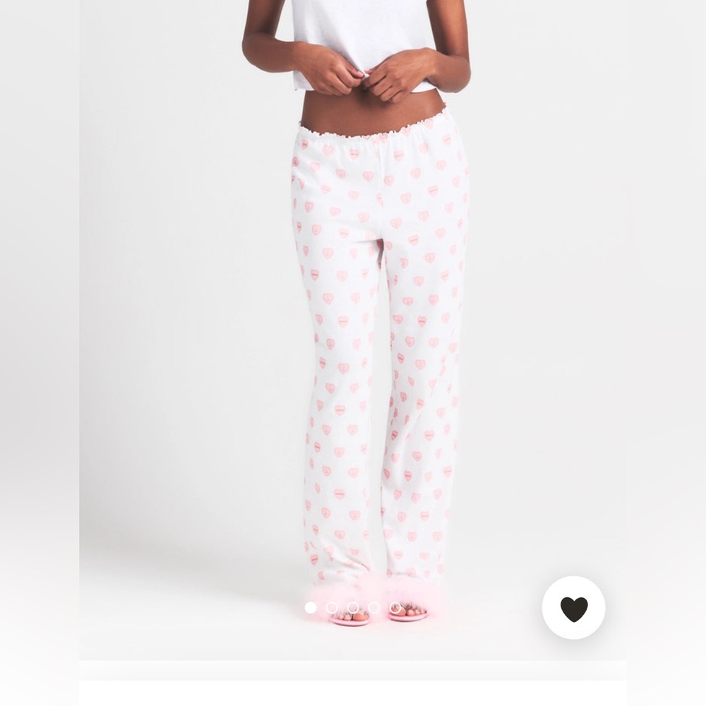 SKIMS White Lounge Pants with Pink Heart Design